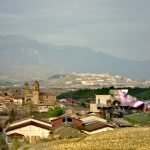 Marques de Riscal winery by Frank Gehry Marques de Riscal winery and Laguardia in the background|baskme private tours|rioja wine tours